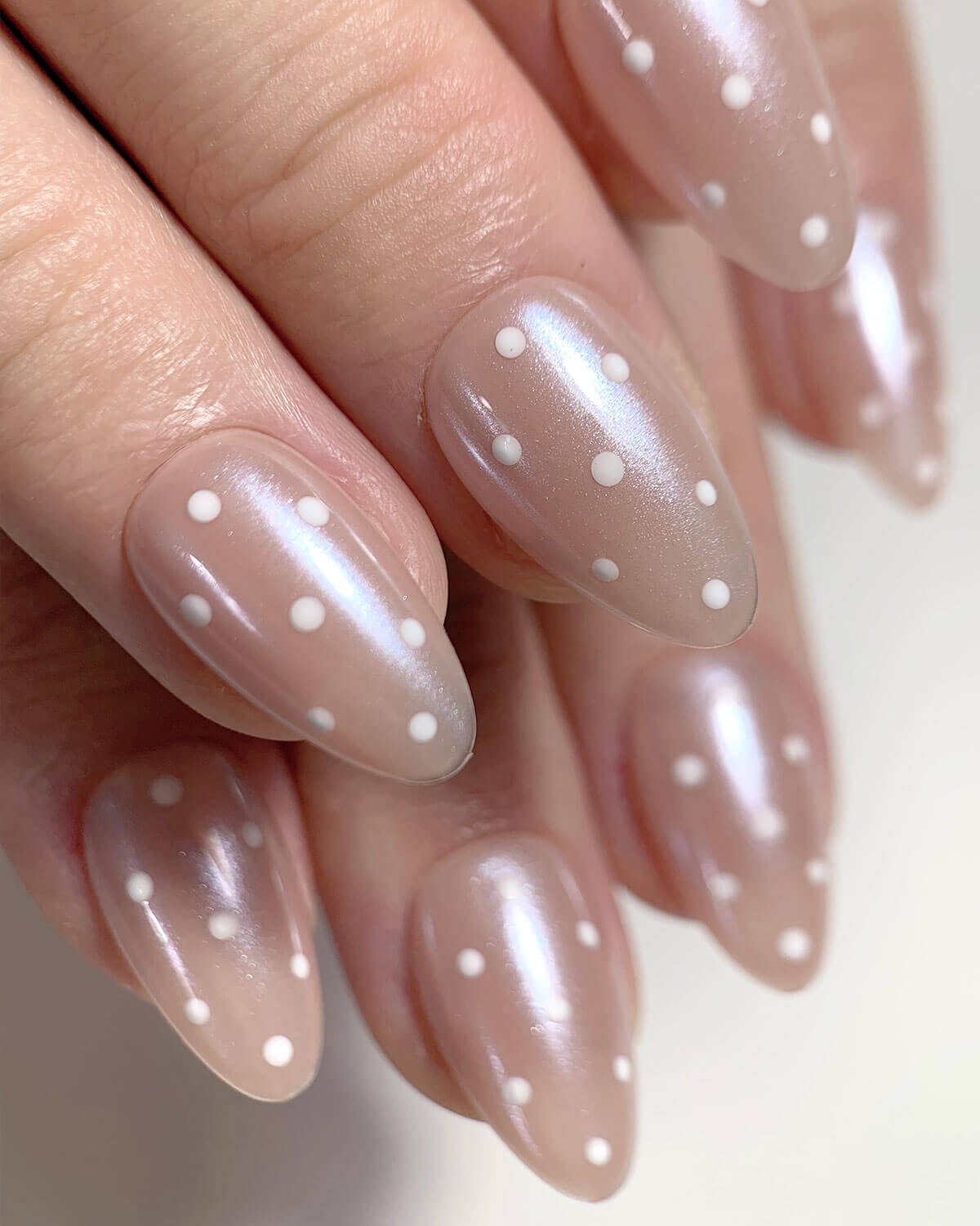 DELICADO DIJE COLOR NUDE